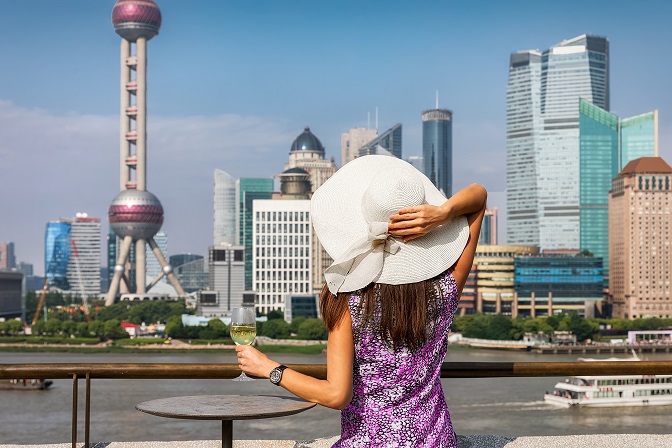 Woman drinking wine in Shanghai